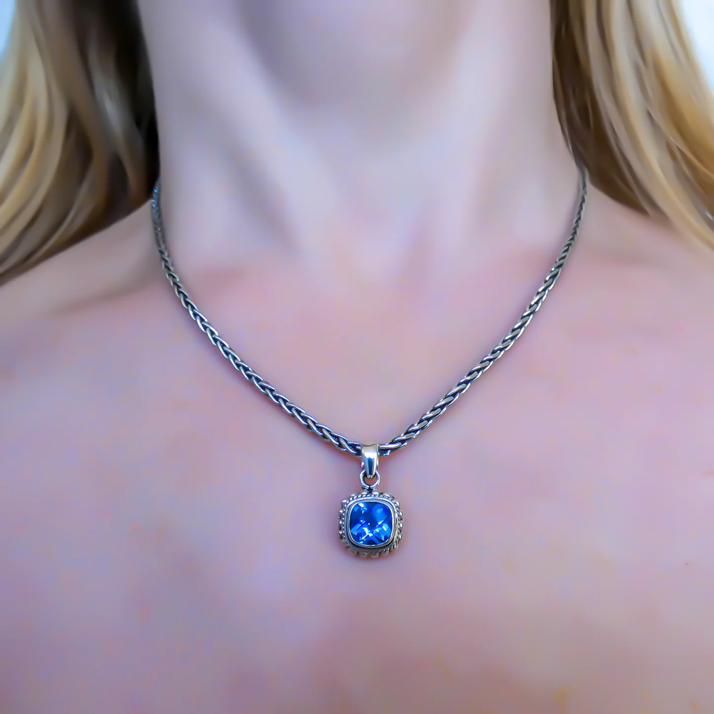 Pendant with a Genuine Swiss Blue Topaz - Sterling Silver
